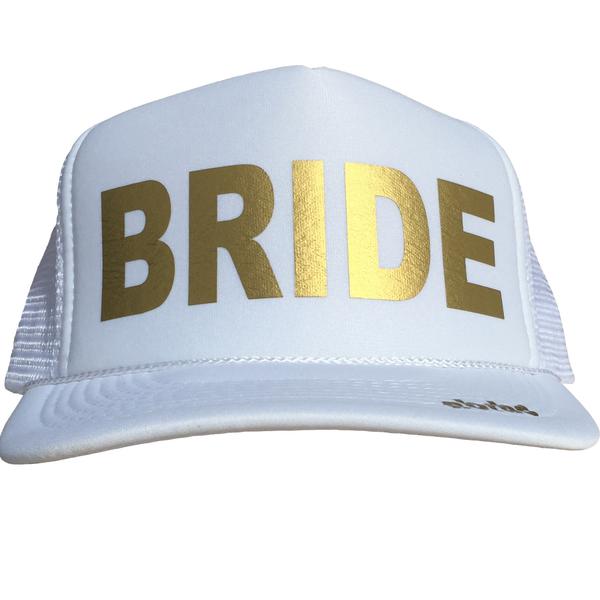 Bride in gold ink on the front panel of a white trucker cap with an adjustable snapback