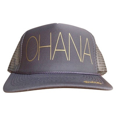 Ohana in gold ink on the front panel of a classic mesh charcoal trucker cap with an adjustable snapback