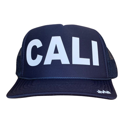 Cali in white ink on the front panel of a navy mesh trucker cap with an adjustable snapback