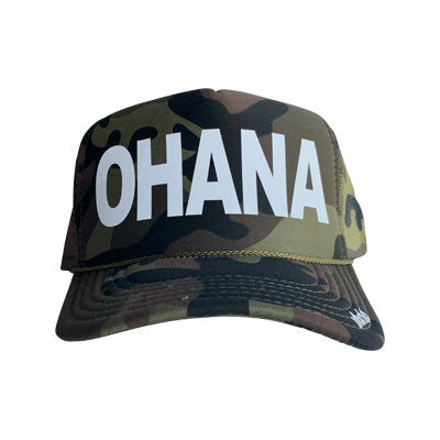 Ohana in white ink on the front panel of a classic mesh camo trucker cap with an adjustable snapback