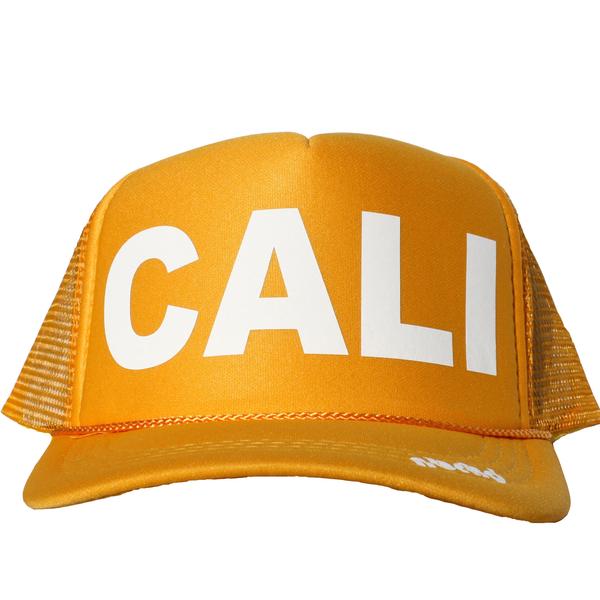 Cali in white ink on the front panel of a yellow mesh trucker cap with an adjustable snapback