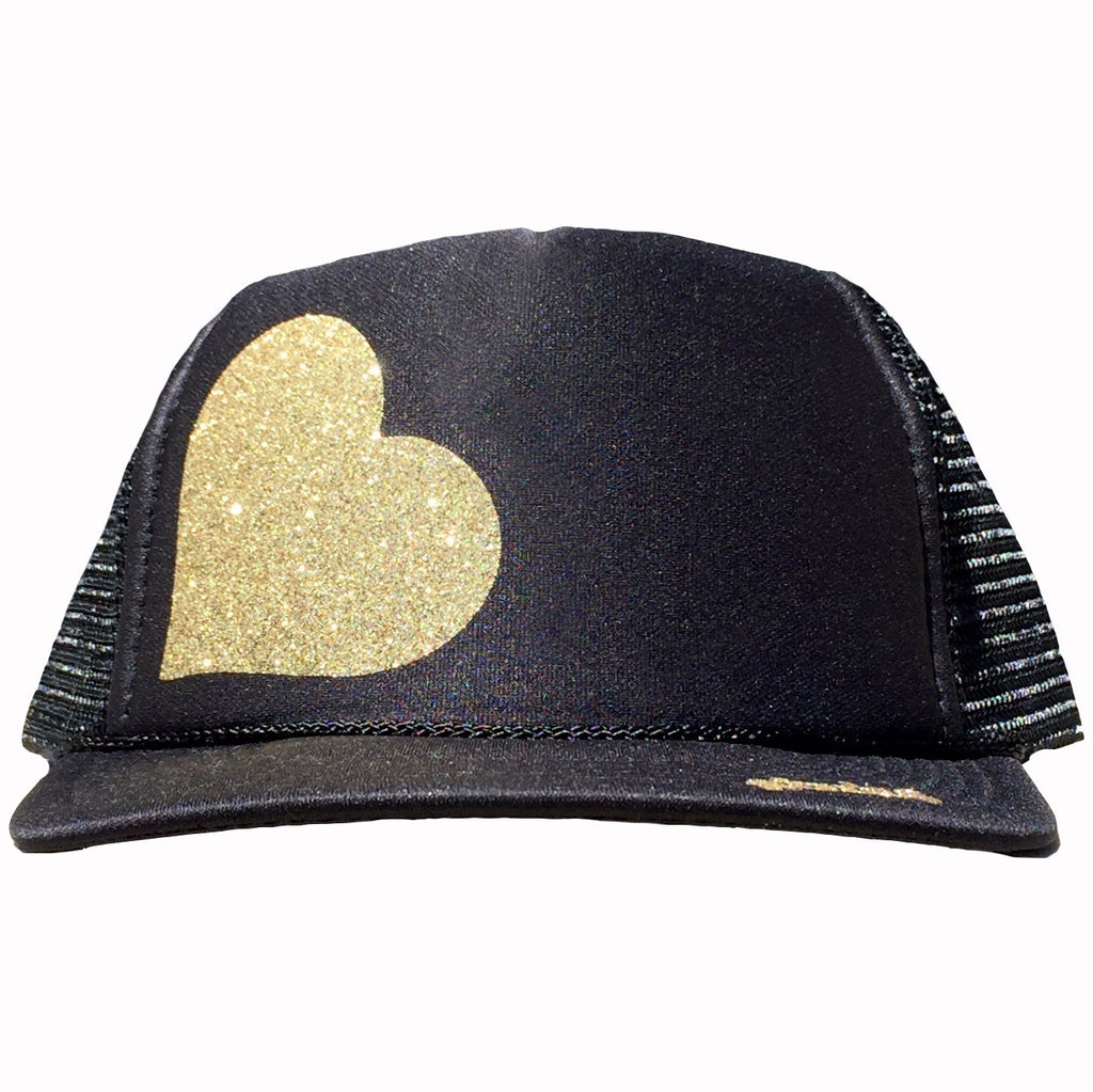 Heart in glitter gold ink on the front panel of a classic mesh black trucker cap with an adjustable snapback