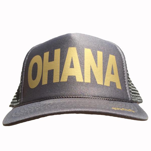 Ohana in gold ink on the front panel of a classic mesh charcoal trucker cap with an adjustable snapback